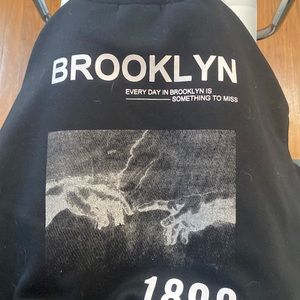 Women’s plain black front design back crew neck sweater